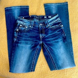 Miss Me bootcut jeans with rhinestone detail.